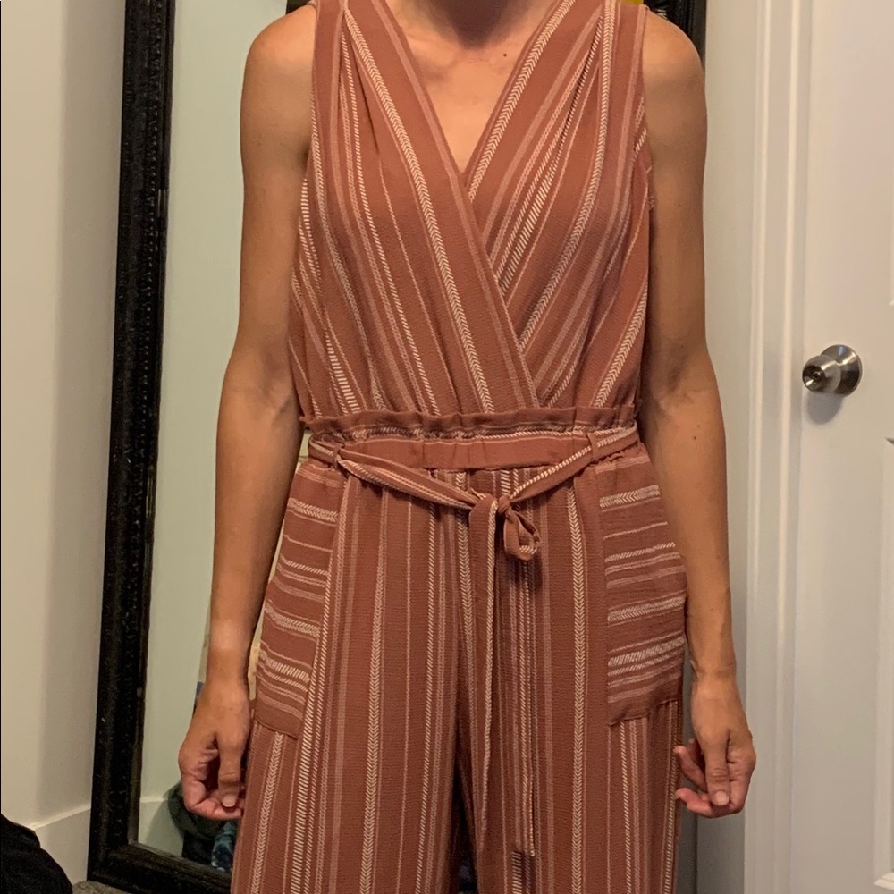 Adorable dusty rose romper.